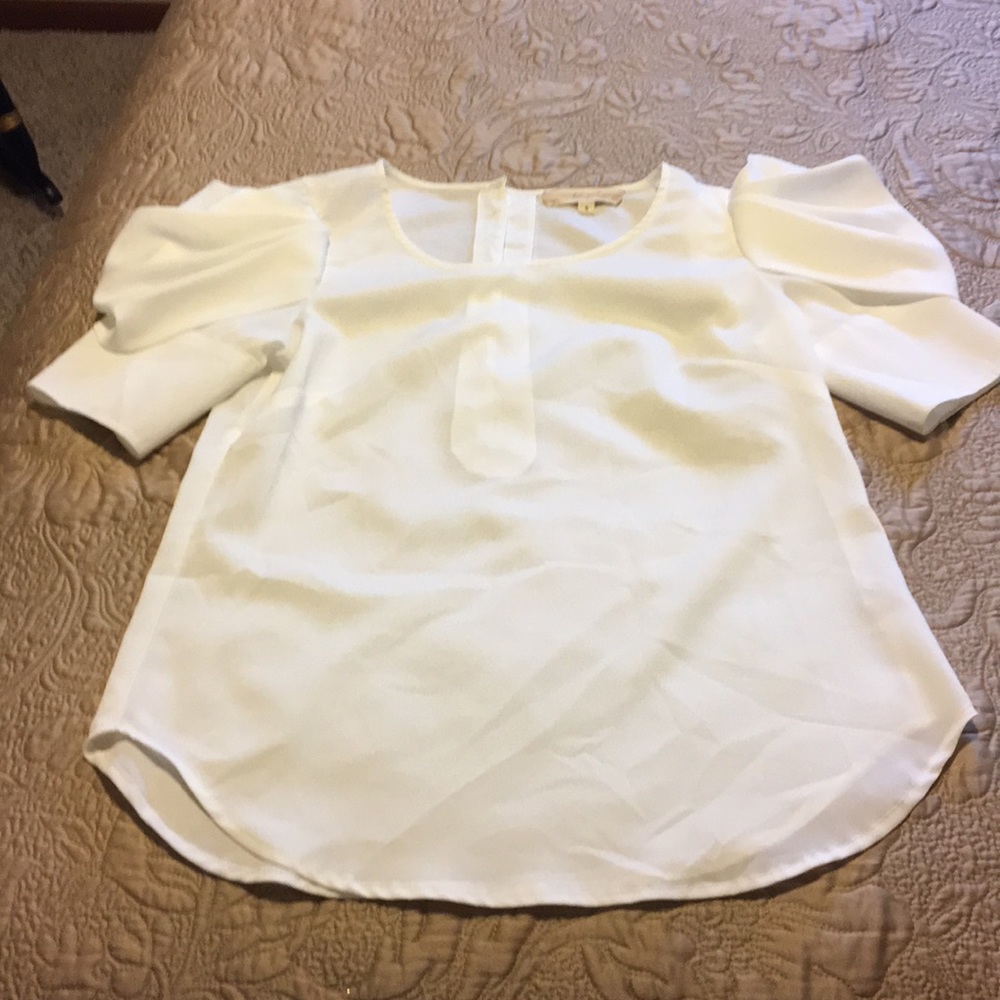 White/cream blouse